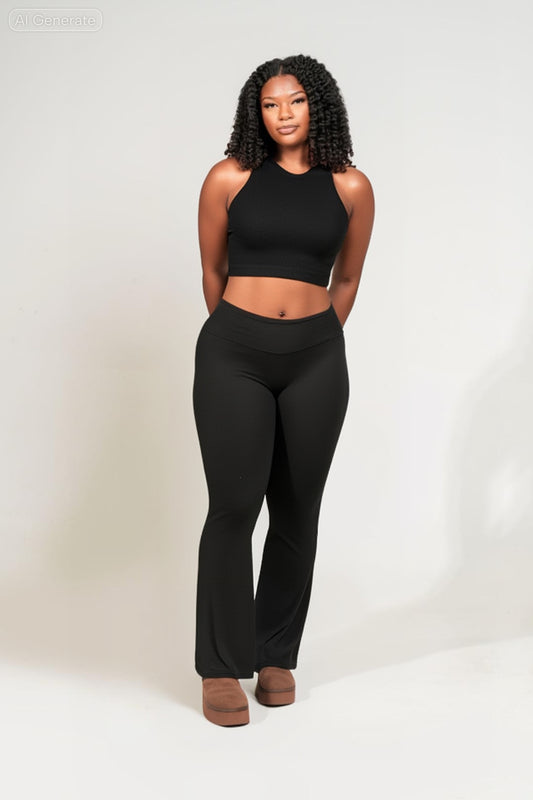 Woman wearing a black outfit on a white background. Buttery_Soft_Flare_Leg_High_Waist_Yoga_Pants._black